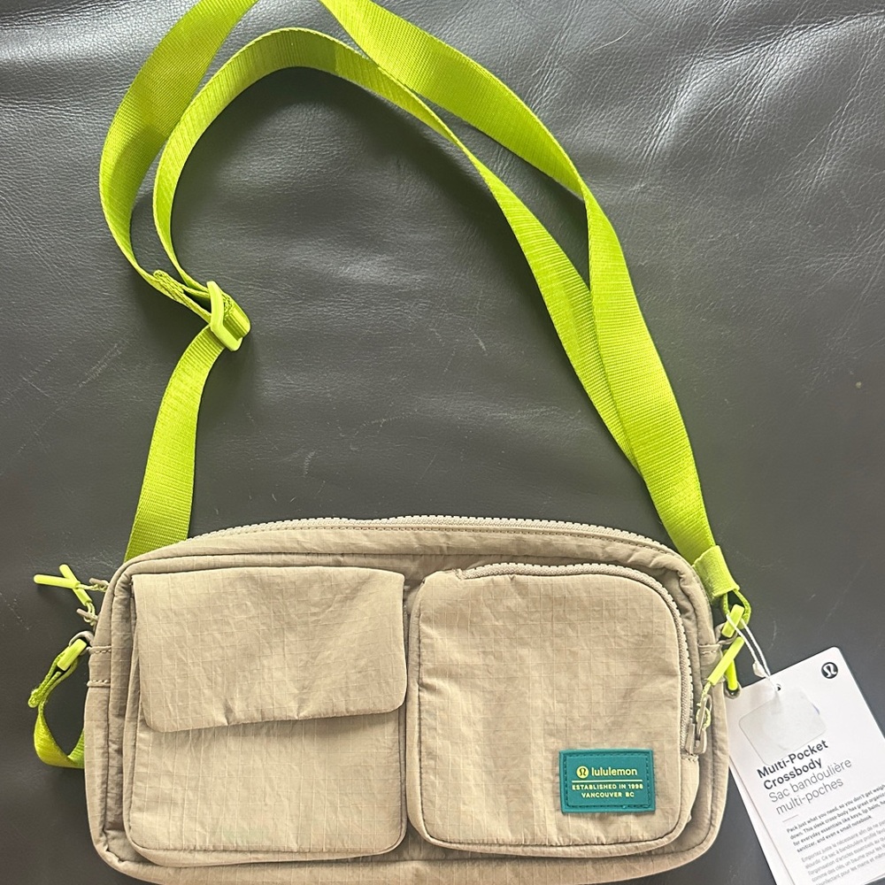 lululemon athletica Beige Crossbody Bag with Neon Yellow Strap